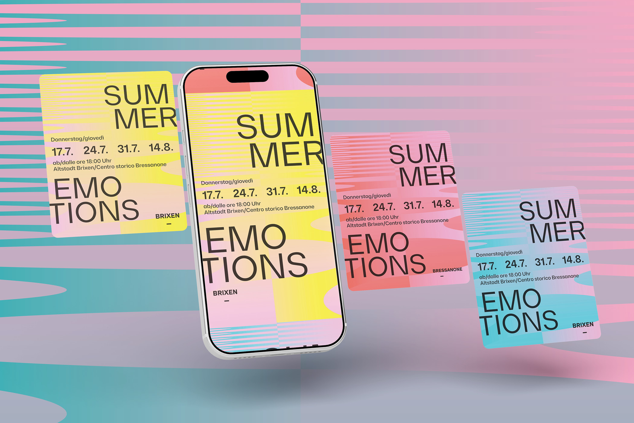Bunte Flyer und Smartphone mit Eventdaten zu Summer Emotions in Brixen.